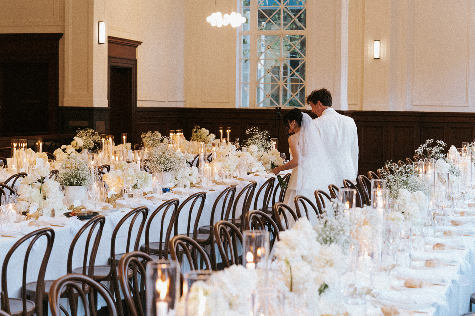 Wedding couple admiring the reception styling